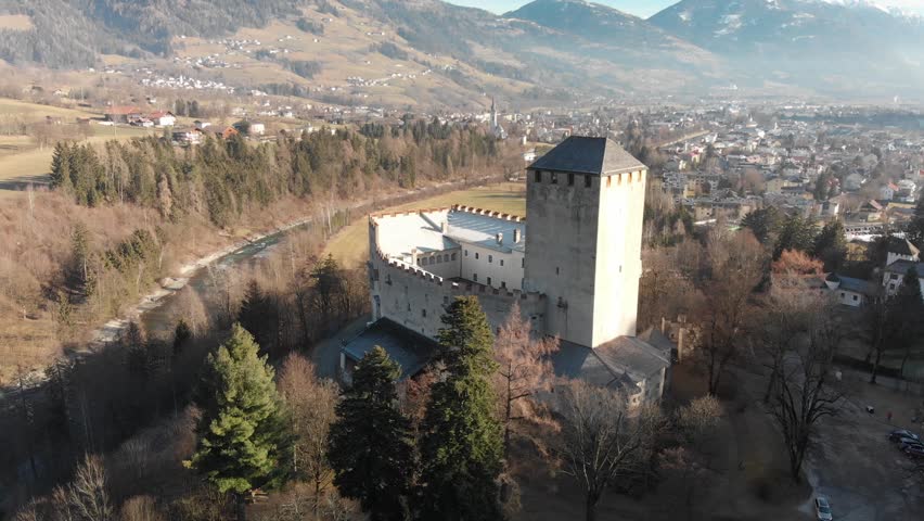 Aerial view of Lienz Castle and valley in winter season, Austria.