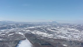 Descending on landscape with mountain Rtanj in background 4K aerial video