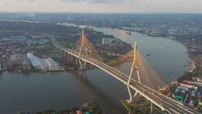 Fly over Bhumibol Bridge, Industrial ring bridge in morning, Samutprakarn, Bangkok, Thailand, in 4k video