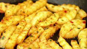 Close up video of making french fries with crinkle-cut potato