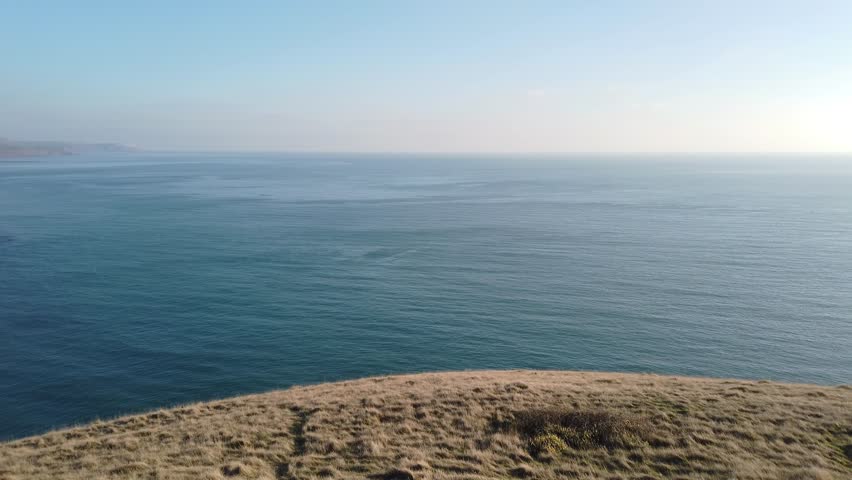 Pan across the dramatic Jurassic Coast in Dorset, UK