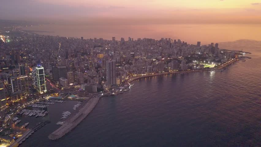 Flying over Beirut bay marina and downtown. Drone aerial shot of Beirut, Lebanon, during sunset. Royalty-Free Stock Footage #1022918779