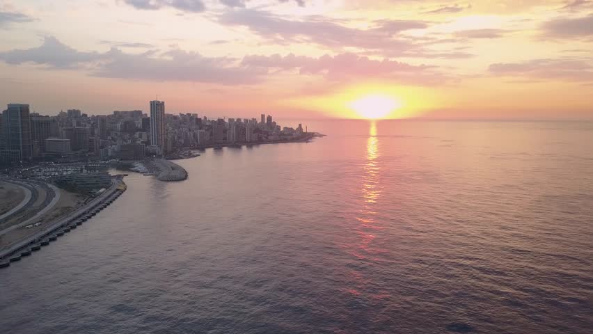 Flying over Beirut bay marina and downtown. Drone aerial shot of Beirut, Lebanon, during sunset. Royalty-Free Stock Footage #1022918791