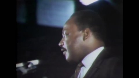 CIRCA 1968 - In a speech in Memphis, Martin Luther King urges the enthusiastic audience to join him in protest.