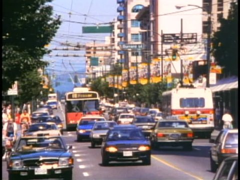 VANCOUVER, BRITISH COLUMBIA, 1990, Busy traffic shot with buses and cars