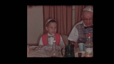Young Jewish boy asks the Four Questions at Passover Seder 1956