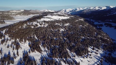 flying over the mountains in Colorado in winter