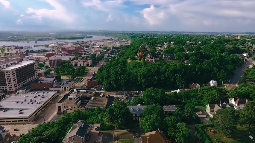 Aerial views of downtown Dubuque IA featuring bridge and river