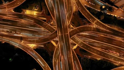 City highway interchange at night transition to tiny planet.  Drone shot from above of city planet surreal 360 panorama shot. Little planet warped view effect of Shanghai cityscape.