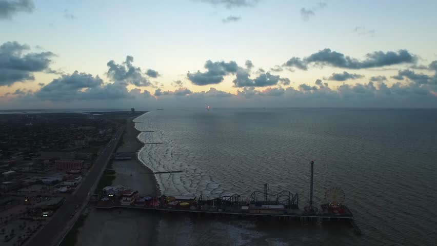 Daytime aerial view of Galveston island on the Texas Gulf coast, USA with Kemah Boardwalk in the foreground.