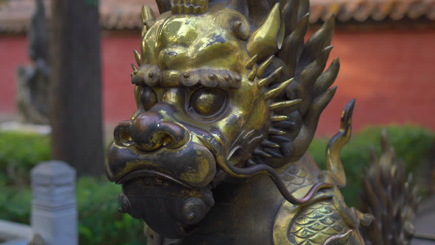 bronze dragon situated inside of an inner part of the Forbidden city - ancient palace of China
