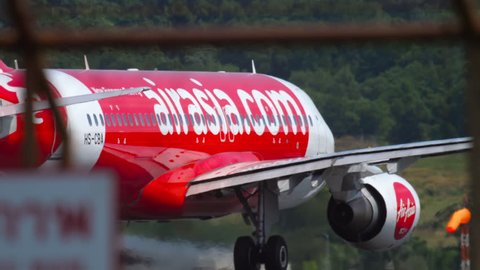 PHUKET, THAILAND - NOVEMBER 30, 2018: Air Asia Airbus A320 with registration HS-CBA accelerate before departure from Phuket airport.
