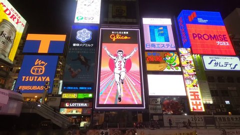 OSAKA,JAPAN- October 30, 2018 : Night view of the neon advertisements Dotonbori in Osaka, Japan.Is famous for its historic theatres,and restaurants, and its many neon and mechanised signs.