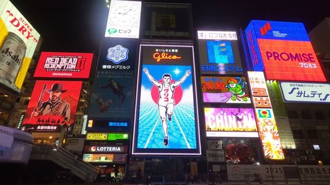 OSAKA,JAPAN- October 30, 2018 : Night view of the neon advertisements Dotonbori in Osaka, Japan.Is famous for its historic theatres,and restaurants, and its many neon and mechanised signs.