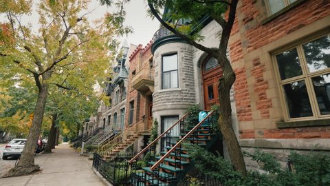 A street with old Victorian houses in Montreal, Canada
