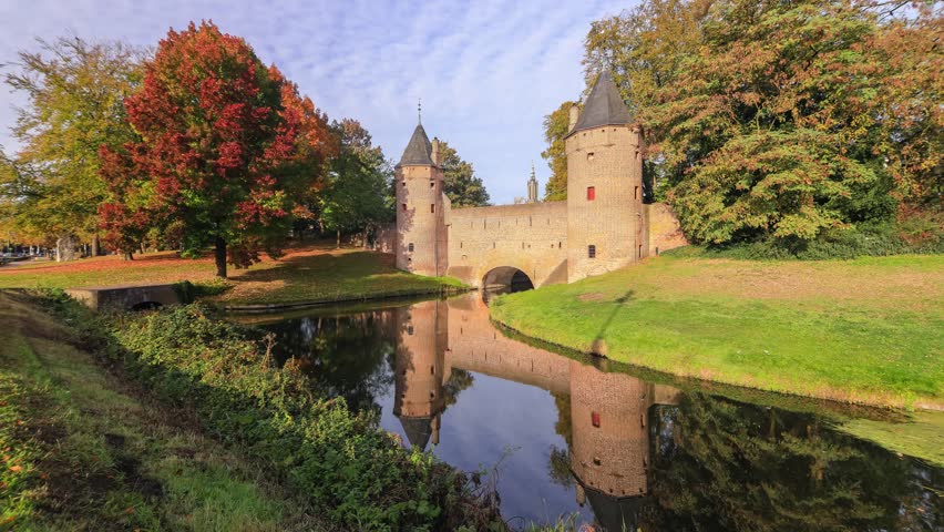 Amersfoort, Netherlands - October 2018: Timelapse od the Old Town Wall wit hthe river