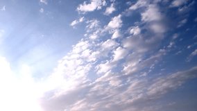 Blue light clear sky, white rolling, building clouds, beautiful fast motion formating, fluffy cloudscape in panoramic view, nice clean weather in summer sunny day time. -UHD.