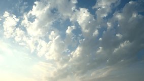 Blue light clear sky, white rolling, building clouds, beautiful fast motion formating, fluffy cloudscape in panoramic view, nice clean weather in summer sunny day time. -UHD.