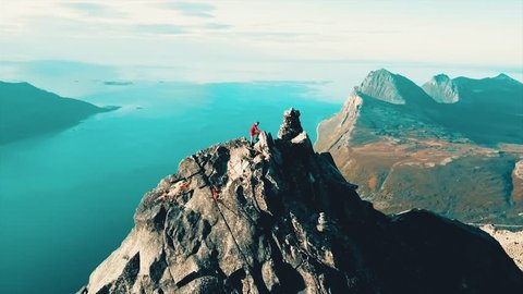 In northern Norway, there rises a mountain out from the ocean. Reaching the top is a feat saved for the most experienced mountaineers.