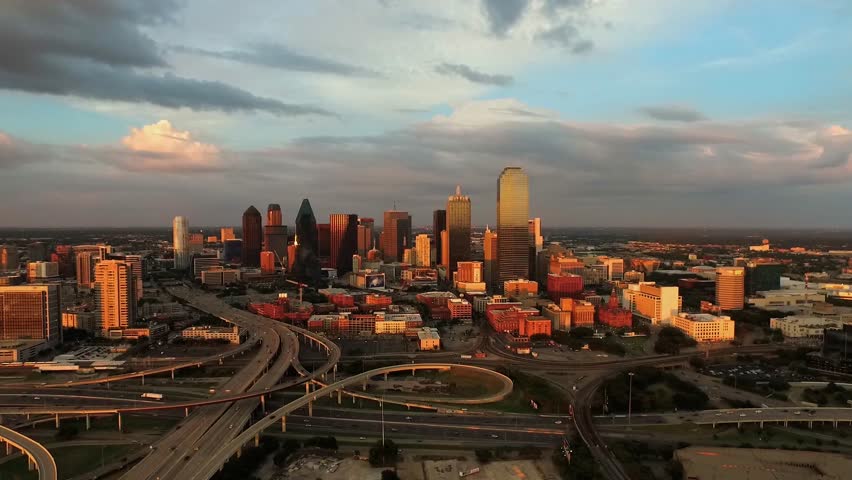 Aerial footage as the sun sets of the skyline of Dallas, Texas, USA.