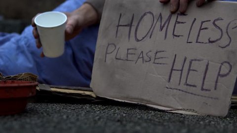 Homeless Man Sat Begging With Sign 'Please Help' On Road, 4K.