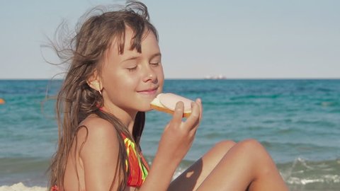 Child Eating On Beach Little Girl Stock Footage Video (100% Royalty ...