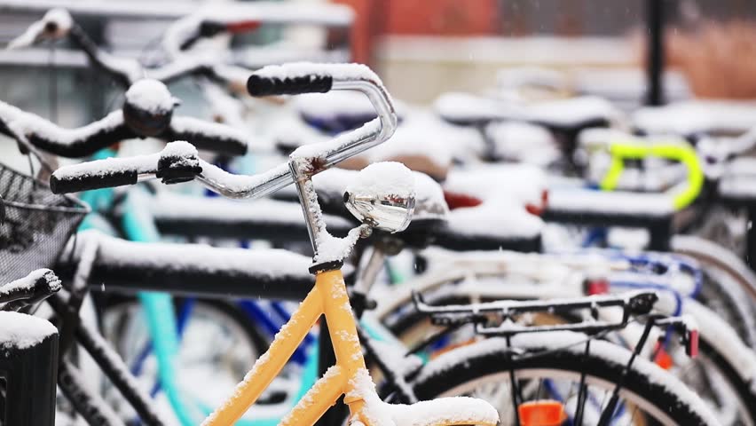 video of a vintage bike during a heavy snowfall in Europe