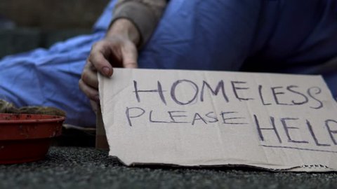 Homeless Man Sat Begging With Sign 'Please Help' On Road, 4K.