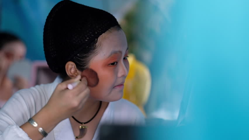 Georgetown, penang / malaysia - 07 08 2018: georgetown, penang, august 2018  - a chinese opera performer gets ready backstage in part of the hungry  ghost festival