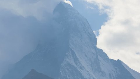 Motion time lapse of cloud formations formed by air vortices East and North face Matterhorn, Zermatt, Switzerland