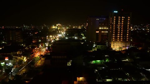 Night time-lapse Rich vs. Poor people, Java, Indonesia.