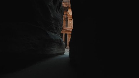 Petra - ancient city, view of Treasury from As Siq gorge. Jordan. Tilt up. 4K