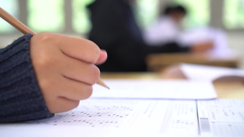 Group of Asian girl high school, university student having test exams for taking writing examination in school rows chairs at classroom of Thailand. Educational exam assessment Concept Royalty-Free Stock Footage #1023170122
