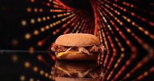 Hamburger fast food on fire background.