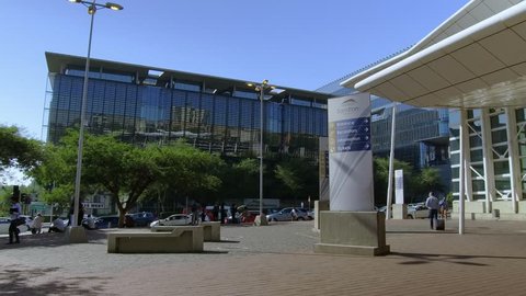 Johannesburg, South Africa - 22 January - 2019: Train station entrance in city centre. Camera moves forward.