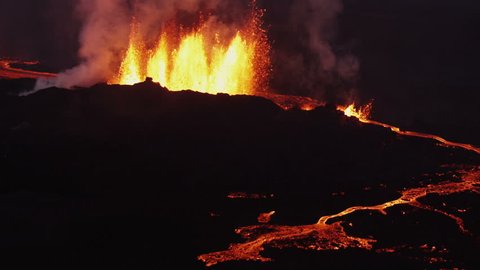 Aerial darkness lava rivers nature molten fire eruption Holuhraun volcano geology seismic pollution force Bardarbunga Iceland RED EPIC