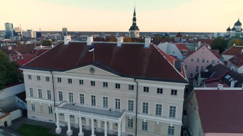 Shot of Estonian Government building (Stenbock's house) and Estonian flag waving in the wind. 50% speed