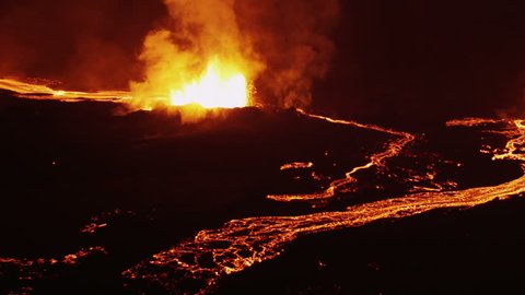 Aerial night volcanic lava Holuhraun eruption magma emerging land fissures seismic activity cloud formation Iceland Europe RED EPIC