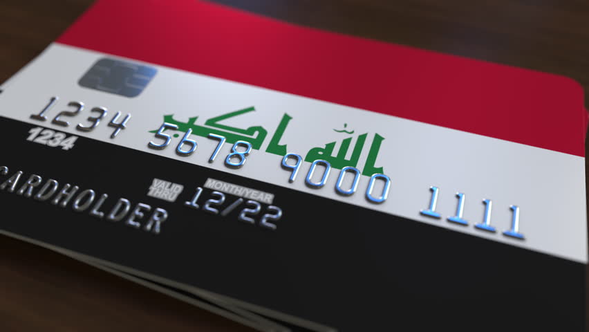 Plastic bank card featuring flag of Iraq. Iraqi national banking system related animation