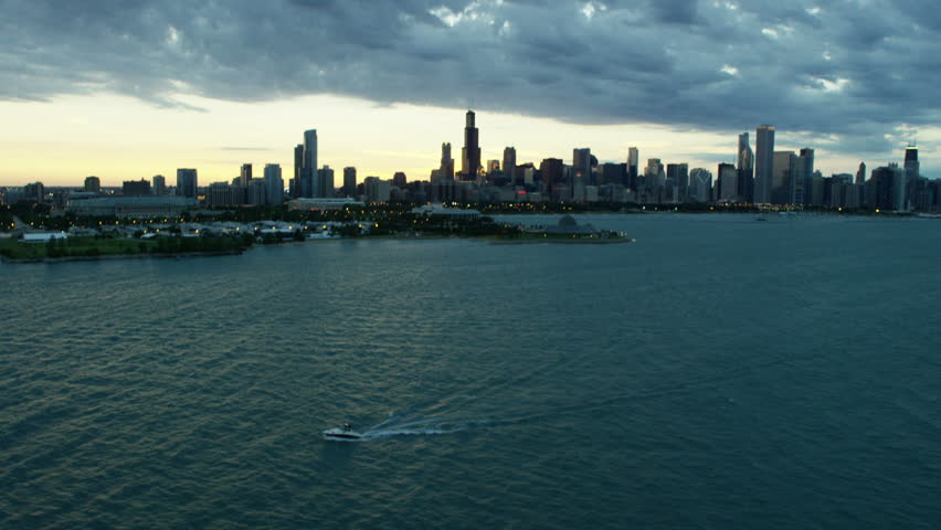Aerial Chicago Illinois USA sunset Navy Pier Illuminated Lake Michigan Harbor Waterfront cityscape Financial District Downtown Business skyscraper building travel RED DRAGON
