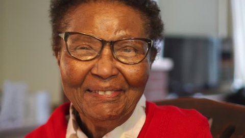 Portrait Of Happy African American Elderly Lady, Laughing And In Good Health, Slow Motion.