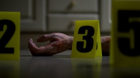 Detail of male murder victim's hand, domestic crime scene site, 4K Part of a 'Crime Scene at Night' collection, with a variety of different camera angles and focal lengths.