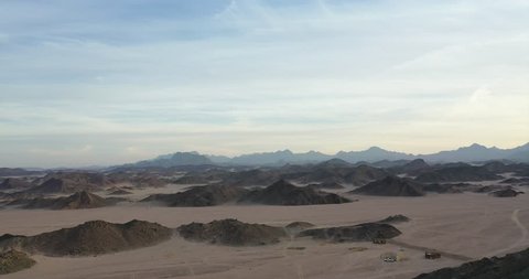Fantastic landscape with mountains. Arabian desert, Egypt. Beautiful nature. Creative toning effect. Drone shot