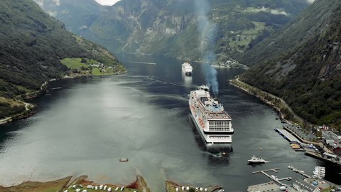 View of the geirangerfjord in Norway, with cruise ships driving trough
