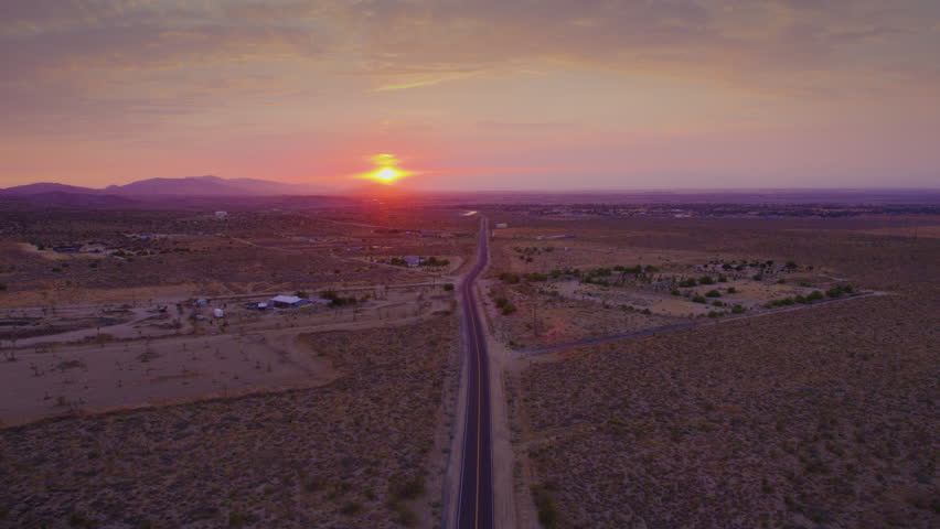 Beautiful Desert Sunset on an empty road Royalty-Free Stock Footage #1023296893