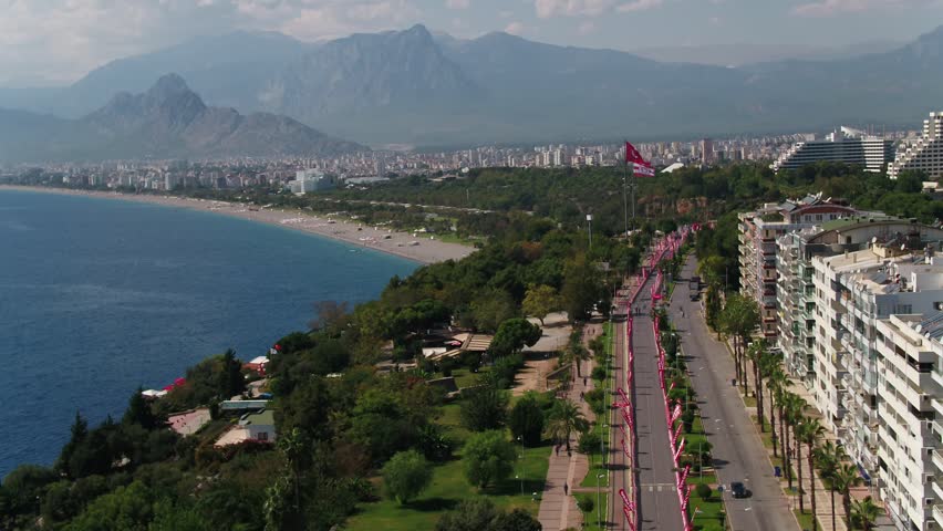 Antalya City and Beach with Turkey and Antalya Flags Aerial View