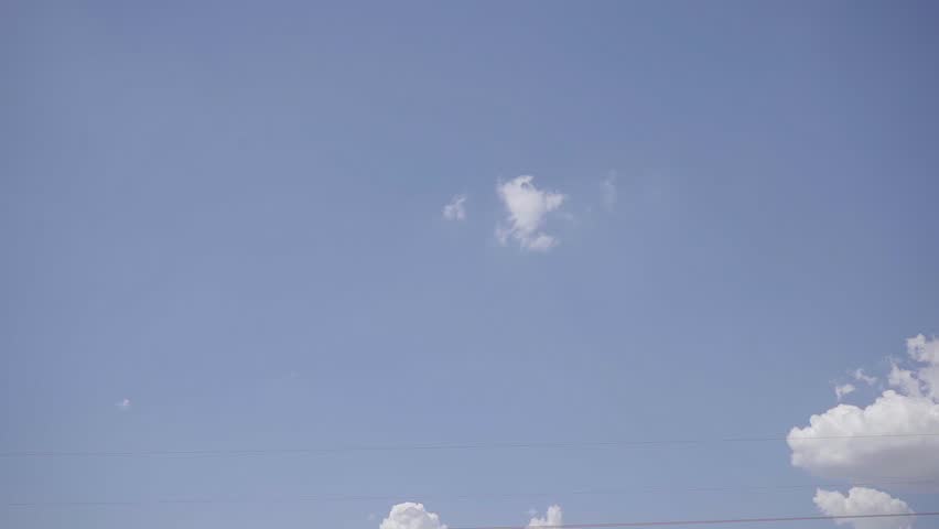 Three Motorbike stunts performs a trick 