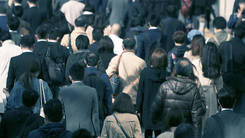 A crowd of Japanese businessmen at work | Shutterstock HD Video #1023312469
