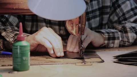 Tailoring shoes leather traditional profession in Tripoli Lebanon. Leather tailoring .50 FPS slow motion