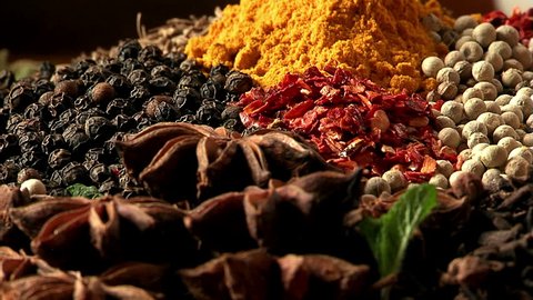 The palette of different food spices. Macro
